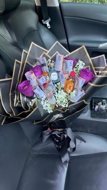 Mini spirits bouquet with cash and purple roses