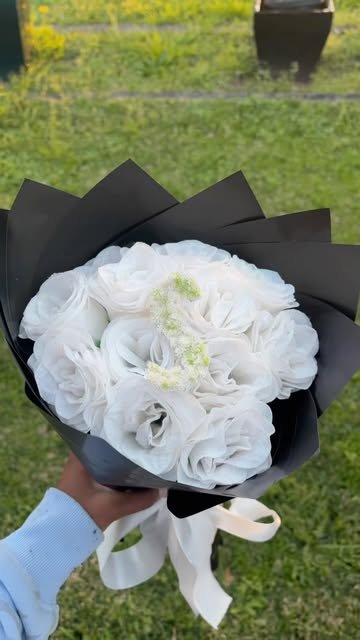 White rose bouquet with black wrap